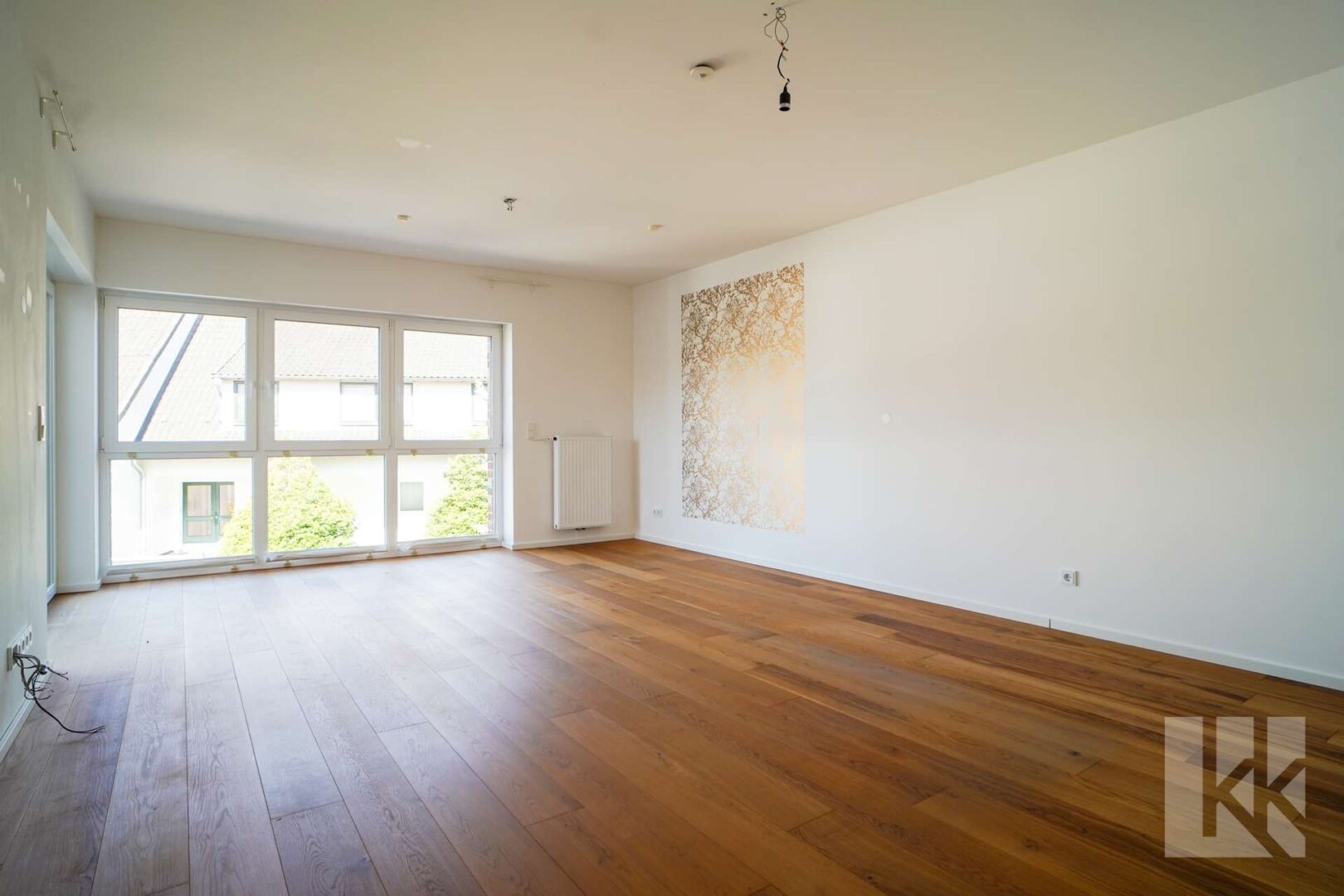 Das Herzstück der Wohnung: Wohn- und Essbereich mit...